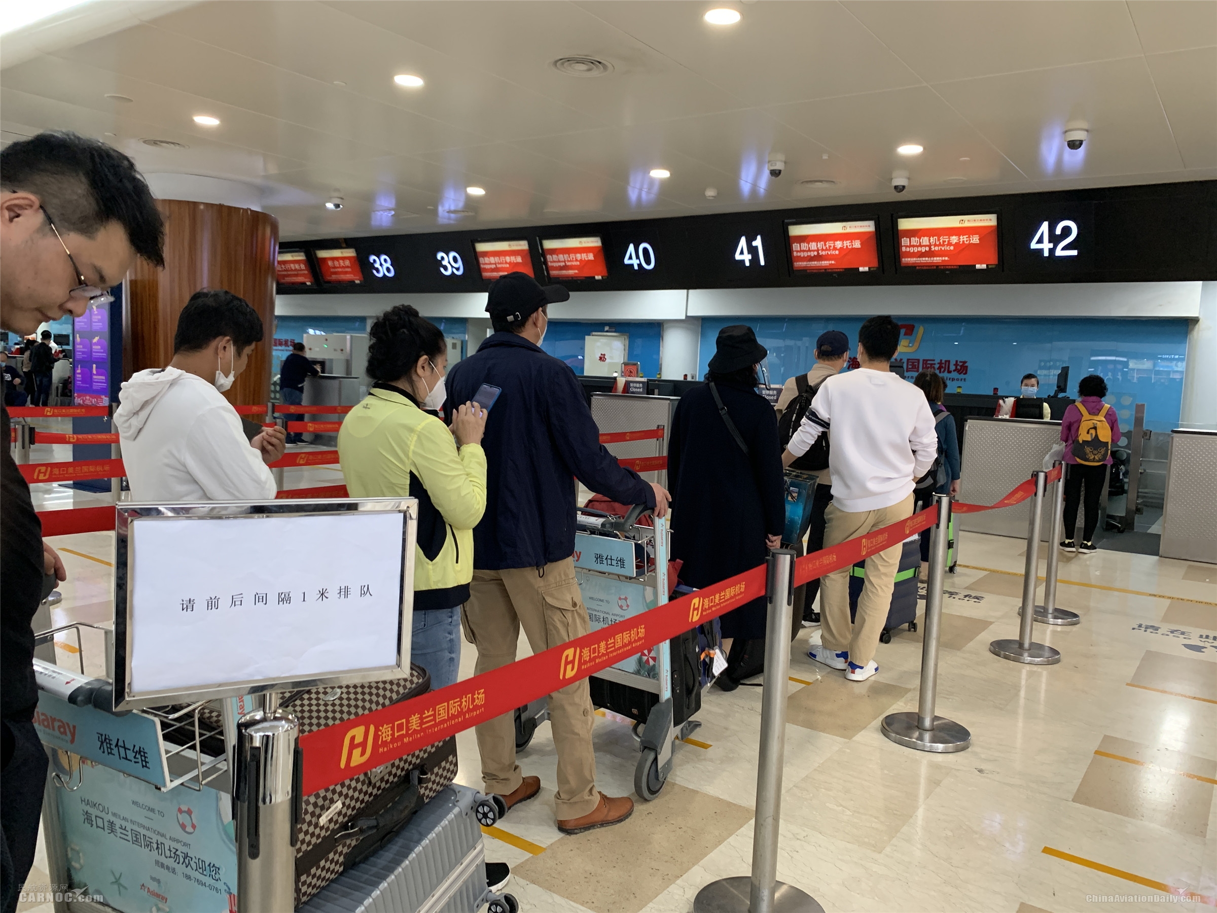 商品編碼查詢-氣溫攀升 客流回暖 海口美蘭國際機(jī)場(chǎng)戰(zhàn)“疫”復(fù)工兩手抓（附圖）